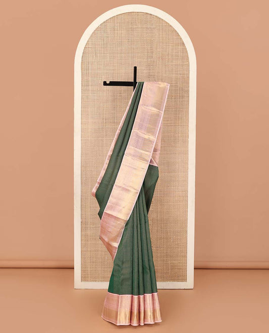 Green kasa kasa kattam Vasundhara silk mix saree, contrast border of rekku, paisa, annam chakram, muthu, rekku, kamalam, and kuyil kann designs, and jaal pallu