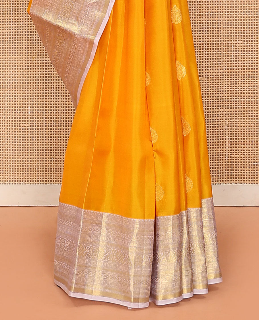 Yellow Vasundhara Lite Silk Mix Saree Subtly Sparked with Zari Buttas, Complemented with a Contrast Border of Rekku, Muthu, Neli, Diamond, Kathir, Mayil Kann, and Kodi Visiry Designs, Elevated with Zari Vanki Pallu, and a Contrast Blouse
