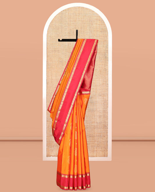 Orange Vasundhara Lite Silk Mix Saree, Ornamented with Zari Buttas, a Contrast Rettai Pettu Border of Mayil Designs, Jaal Pallu, and a Contrast Blouse