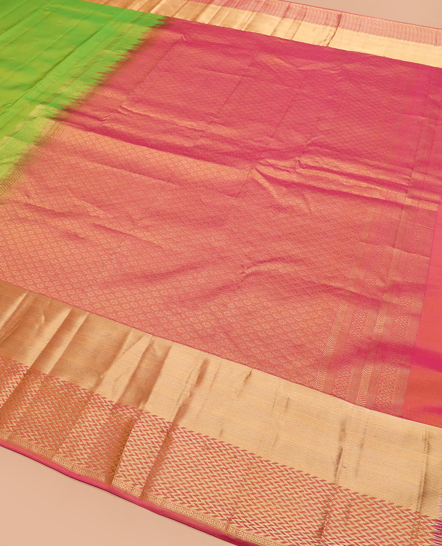 Leaf green zari buttas silk saree, contrast zari border of vanki designs, and jaal pallu