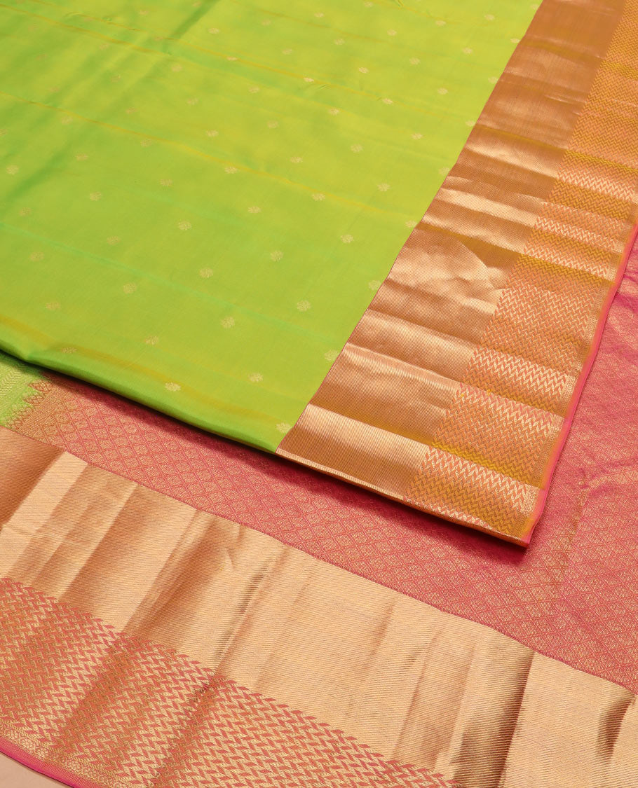 Leaf green zari buttas silk saree, contrast zari border of vanki designs, and jaal pallu