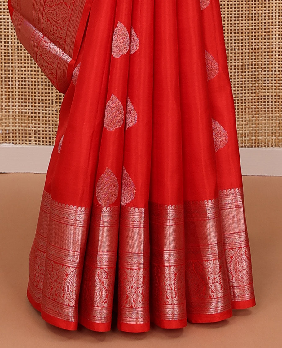Red zari buttas silksaree, zari border of manga mokku,muthu,puli nagam, floral & manga design & zari elevated pallu of leaf motifs