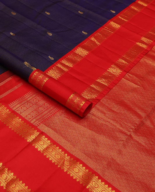 Blue zari striped & buttas silksaree, contrast rettai pettu border of thilakam,banaras,muthu & chakram design & jaal pallu
