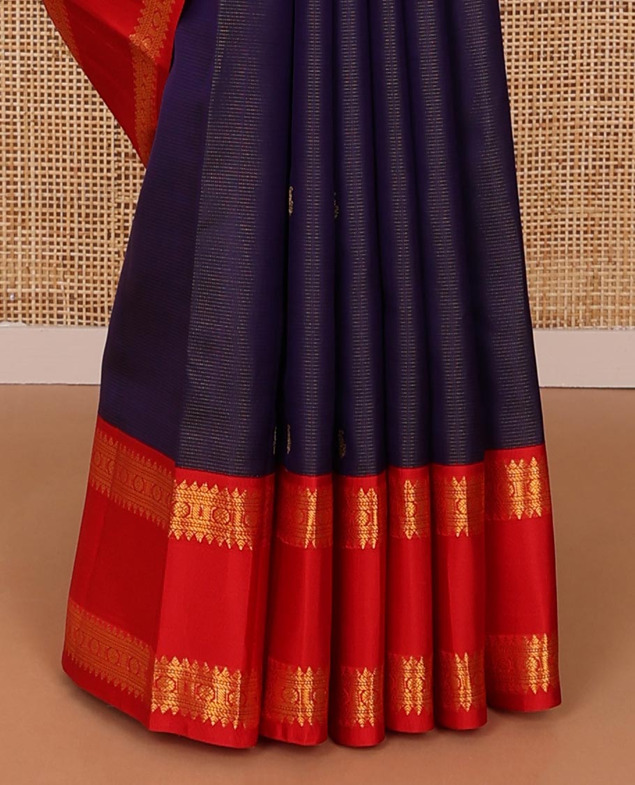 Blue zari striped & buttas silksaree, contrast rettai pettu border of thilakam,banaras,muthu & chakram design & jaal pallu