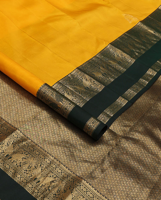 Yellow zari buttas silk saree, contrast rettai pettu border of salngai,banaras,muthu,kili & yaanai designs & jaal pallu