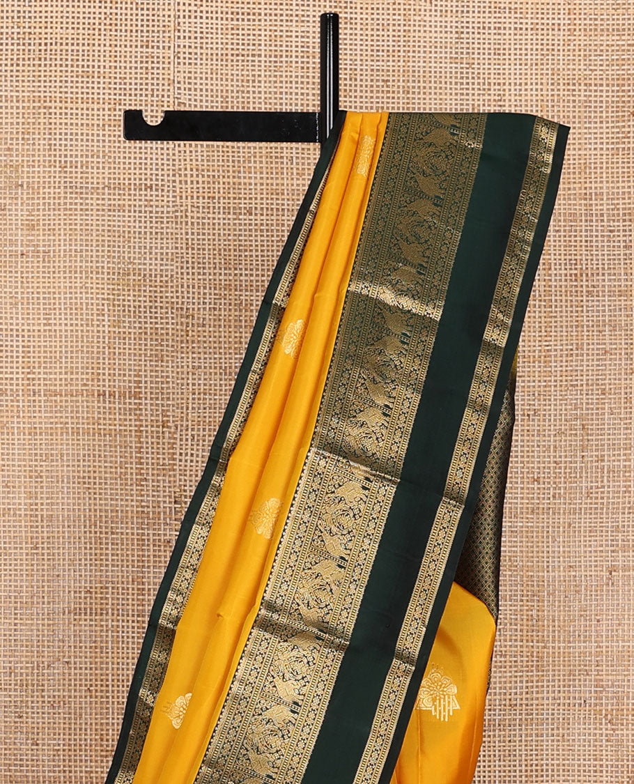 Yellow zari buttas silk saree, contrast rettai pettu border of salngai,banaras,muthu,kili & yaanai designs & jaal pallu