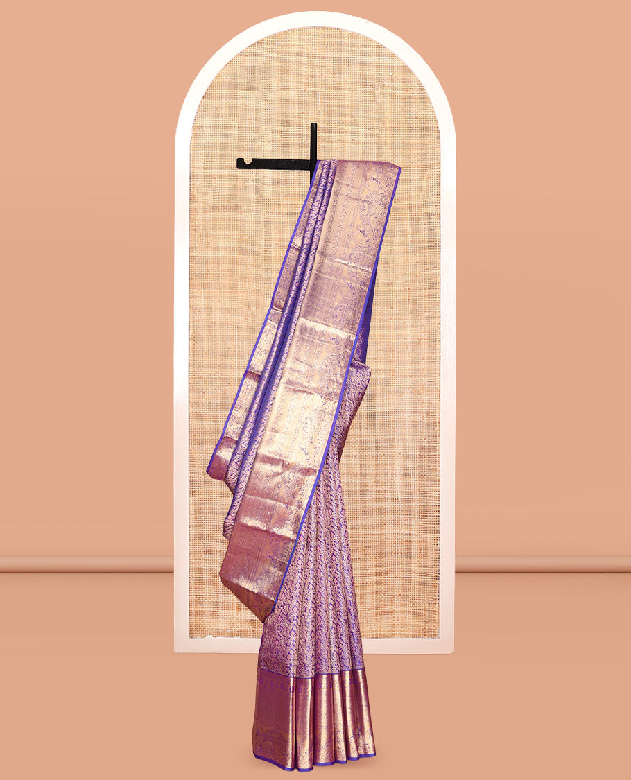 Violet Kanchipuram Wedding Silk Saree, Accentuated with Jacquard Design, a Zari Border of Thilakam, Poun, Diamond, Kodi Visiry, Mayil, and Yaanai, Grand Pallu, and a Matching Blouse
