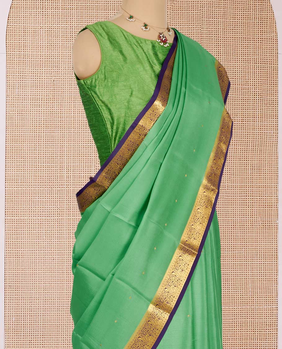 Green Mysore Silk Saree, Gleamed Up with Zari Buttas All Over Its Body, Complemented by a Contrast Traditional Zari Design Border, Zari-Buttas Woven Pallu, and Paired with a Contrast Blouse