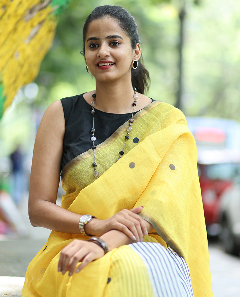 Yellow Linen Cotton Saree, Adorned with Half-And-Half-Style Polka Dots, a Subtle Piping Border, Contrast Vertically Striped Pallu, and a Contrast Blouse