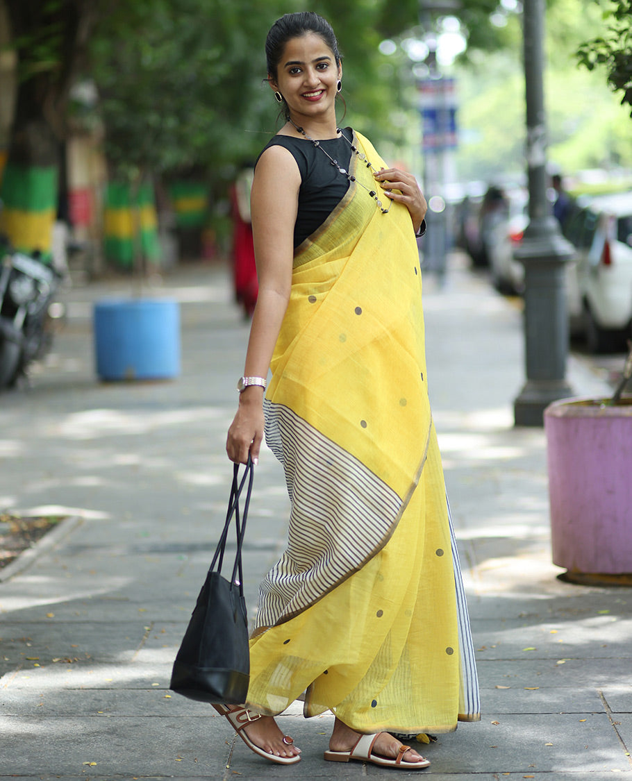 Yellow Linen Cotton Saree, Adorned with Half-And-Half-Style Polka Dots, a Subtle Piping Border, Contrast Vertically Striped Pallu, and a Contrast Blouse