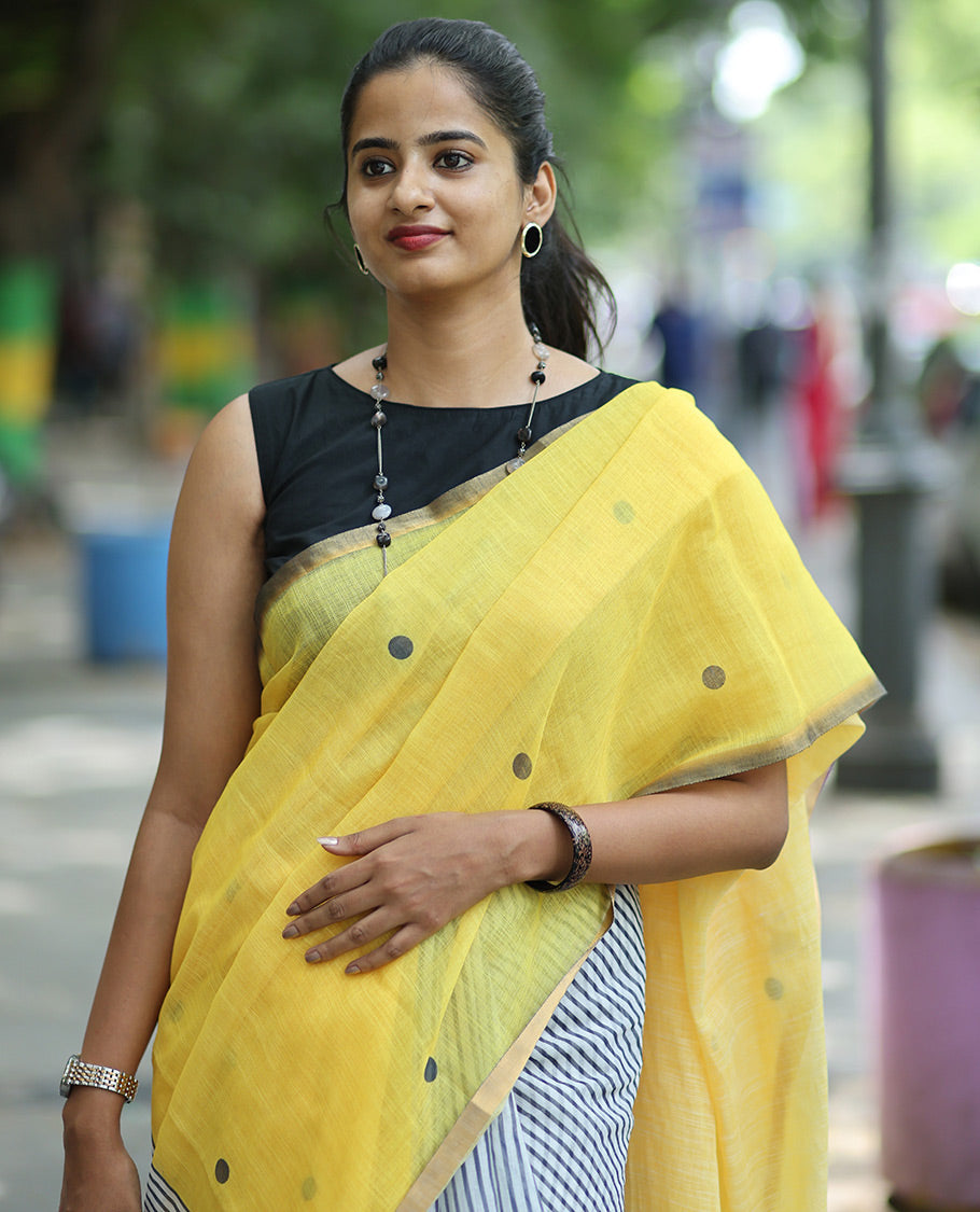 Yellow Linen Cotton Saree, Adorned with Half-And-Half-Style Polka Dots, a Subtle Piping Border, Contrast Vertically Striped Pallu, and a Contrast Blouse