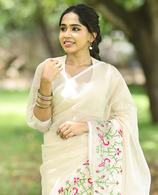 Cream Kota Doria Saree, Subtly Sparkled With Buttas, a Floral-Bird Thread Work Border, a Self-Pallu, a Matching Blouse
