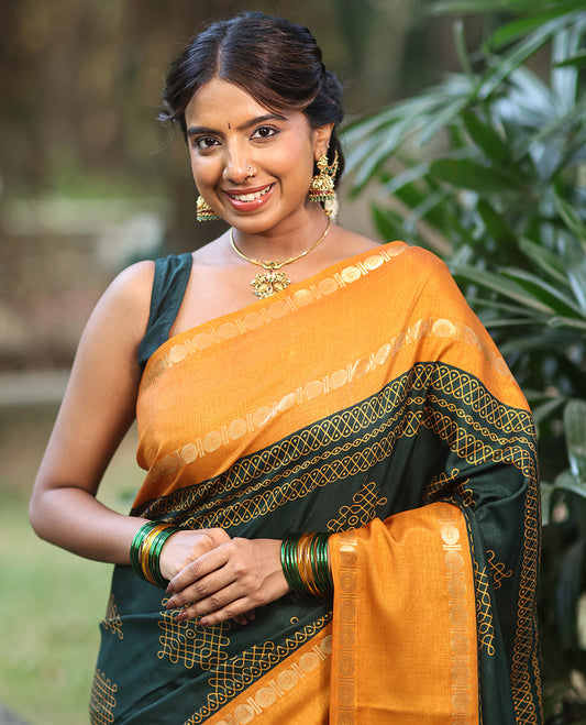 Green Art Tussar Saree, Adorned with Kolam Buttas, a Contrast Rettai Pettu Rudraksham Border, Kolam Pallu, and a Contrast Blouse