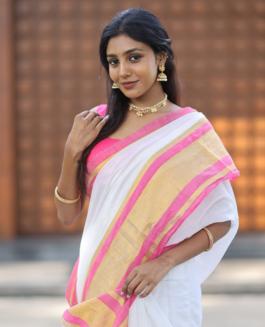 Cream Plain Khadi Mul Cotton Saree, Complemented by a Contrast Pink Zari Border, a Self-Pallu, and No Blouse