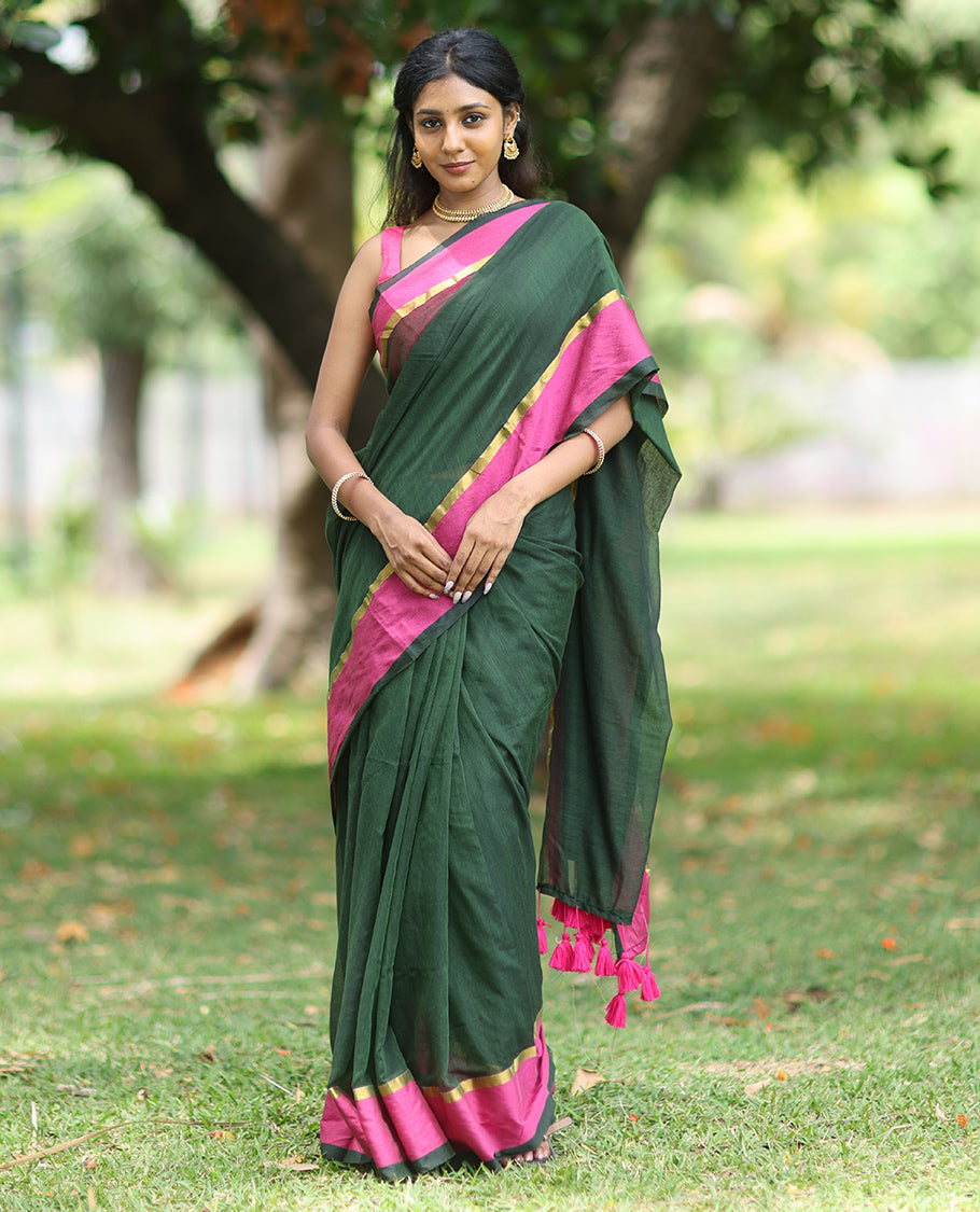 Green Plain Khadi Mul Cotton Saree, a Contrast Satin Plain Border, a Self-Pallu, and a Matching Blouse