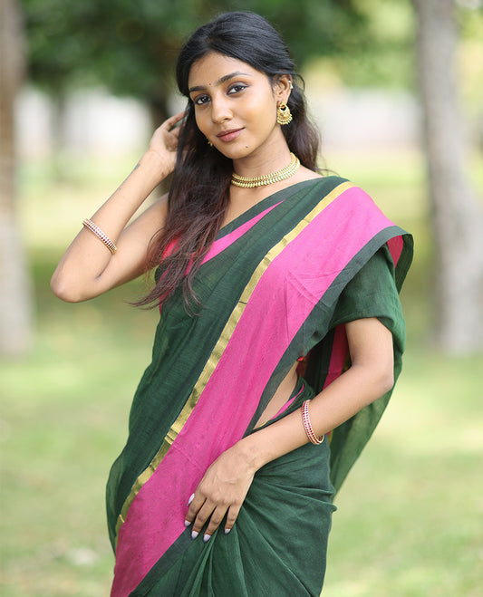 Green Plain Khadi Mul Cotton Saree, a Contrast Satin Plain Border, a Self-Pallu, and a Matching Blouse