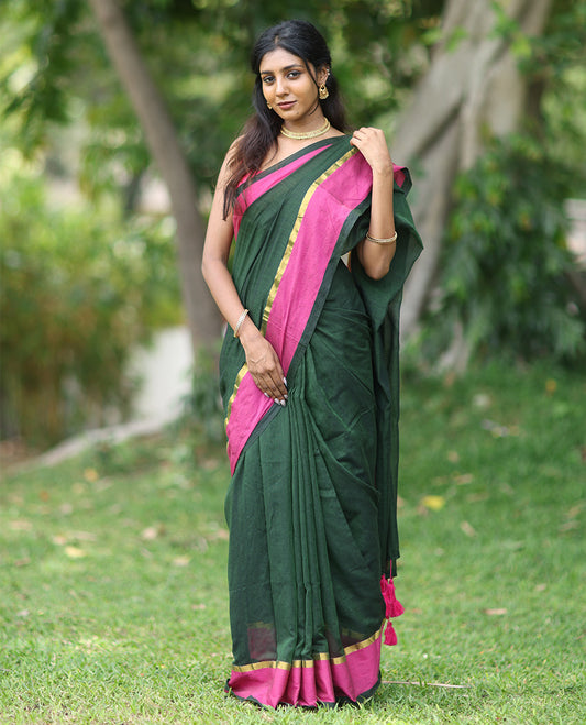 Green Plain Khadi Mul Cotton Saree, a Contrast Satin Plain Border, a Self-Pallu, and a Matching Blouse