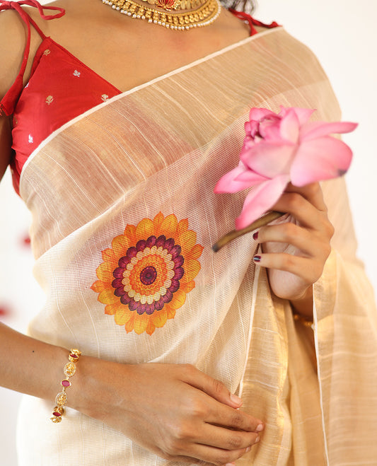 Cream Kerala Cotton Saree, Ornamented with Poo Kolam Print, a Zari Border, Poo Kolam-Printed Pallu, and a Matching Blouse
