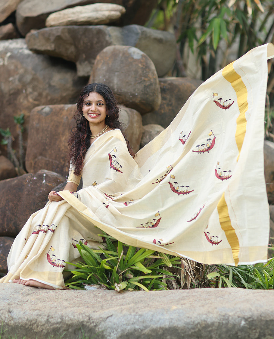 Gold Kerala Tissue Saree, Artfully Detailed with Vallam Kali Motifs, Gold Zari Border, a Self-Pallu, a Matching Blouse