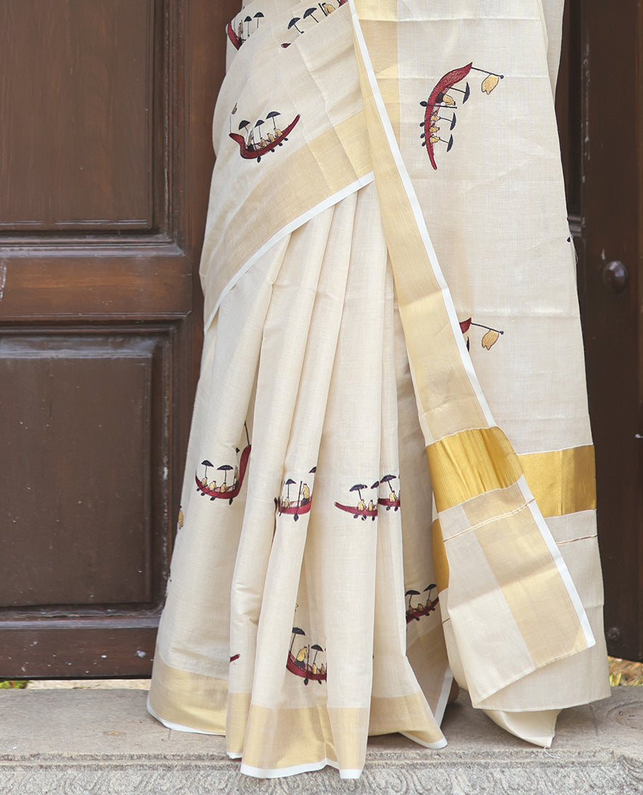 Gold Kerala Tissue Saree, Artfully Detailed with Vallam Kali Motifs, Gold Zari Border, a Self-Pallu, a Matching Blouse