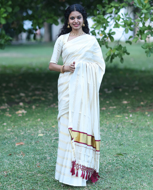 Borderless Cream Kerala Tissue Saree, Richly Detailed with Geometric Zari Stripes, and a Matching Blouse