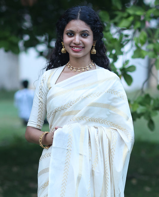 Borderless Cream Kerala Tissue Saree, Richly Detailed with Geometric Zari Stripes, and a Matching Blouse