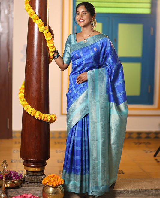 Blue Art Kanchi Silk Saree Features Butta Enclosed Checks, a Contrast Temple Rettai Pettu Border, Grand Pallu, and a Contrast Blouse