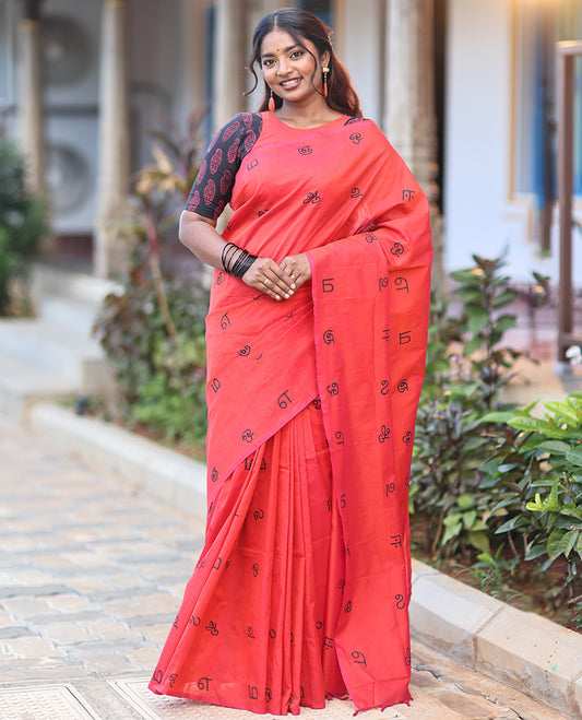 Borderless Red South Cotton Saree, Steeped with Tamil Letters Print, Has a Matching and Contrast Block Printed Blouse