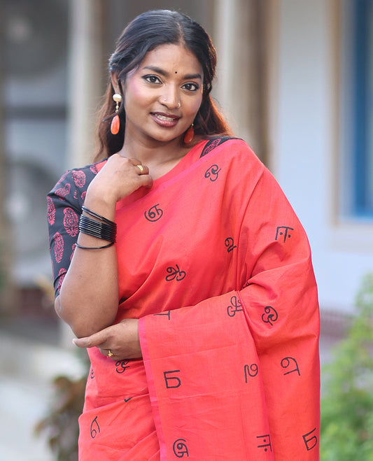 Borderless Red South Cotton Saree, Steeped with Tamil Letters Print, Has a Matching and Contrast Block Printed Blouse