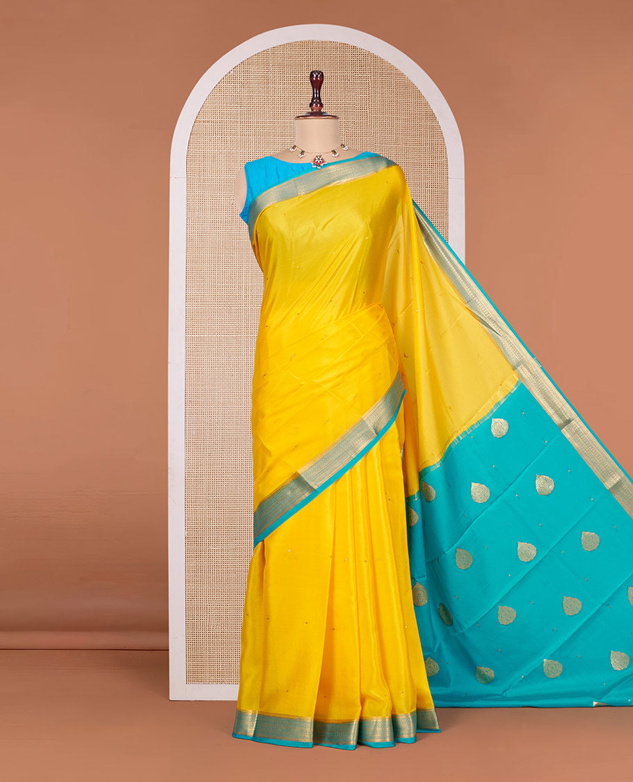 Orange Mysore Silk Saree, Subtly Sparkled with Buttas All Over Its Body, Complemented by a Contrast Traditional Zari Design Border, Zari-Buttas Woven Pallu, and Paired with a Contrast Blouse