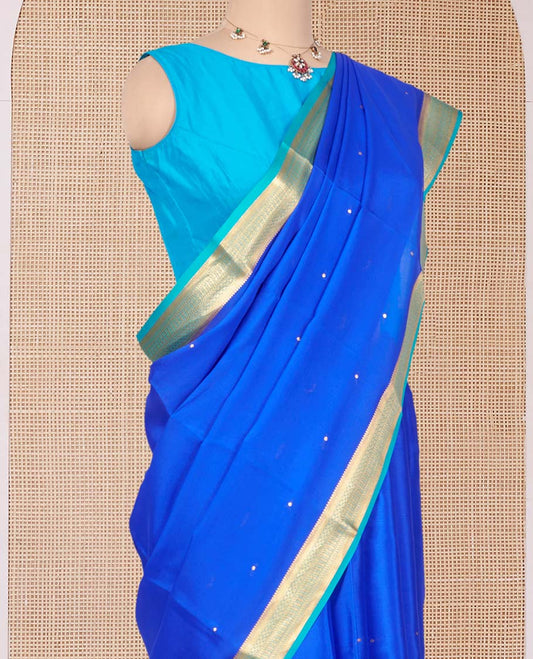 Royal Blue Mysore Silk Saree, Subtly Woven with Buttas All Over Its Body, Complemented by a Contrast Traditional Zari Design Border, Zari-Buttas Woven Pallu, and Paired with a Contrast Blouse