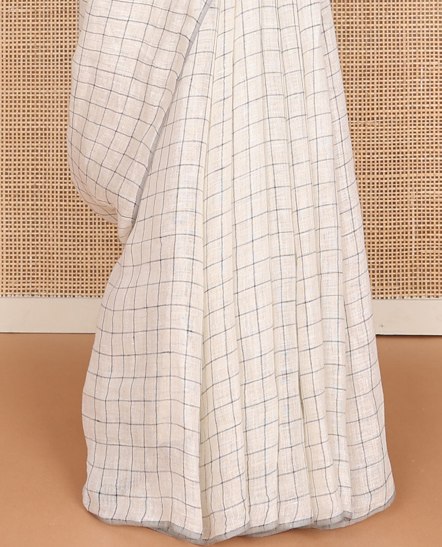 Borderless cream checked linen saree