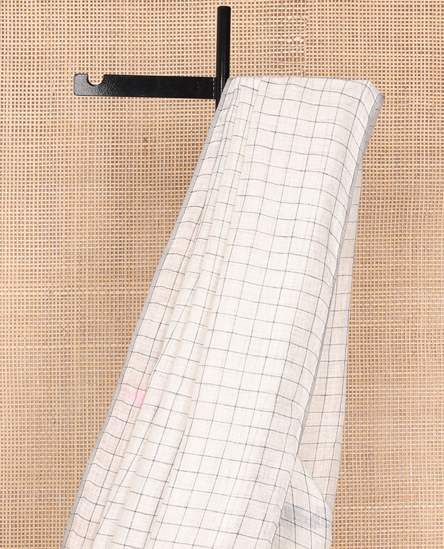 Borderless cream checked linen saree