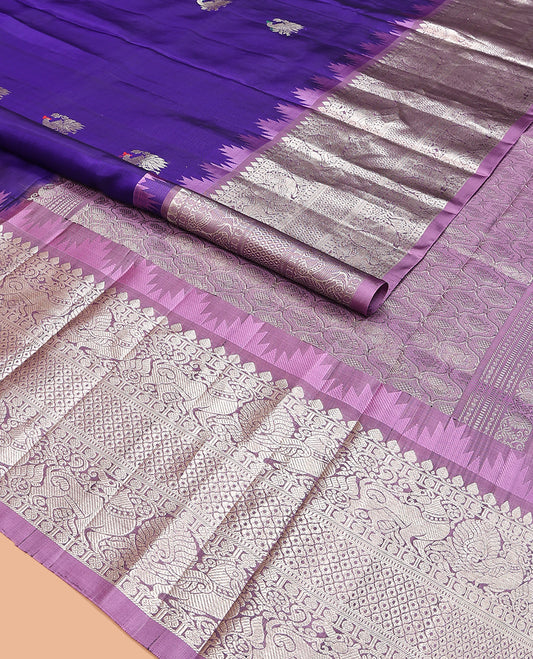 Blue buttas Venkatagiri silk saree, contrast temple traditional border, and ogee patterned pallu