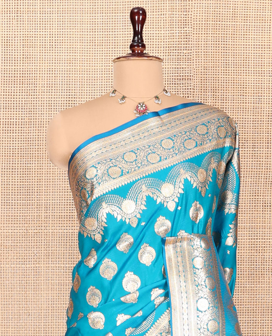 Blue Banarasi Nylon Saree, Impeccably Styled with Zari Buttas, Highlighted by a Traditional Zari Border, Intricate Pallu, and a Matching Blouse
