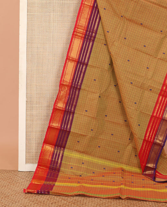 Mustard buttas, and checked Chettinad cotton saree, contrast temple traditional ganga jamuna border, and striped pallu