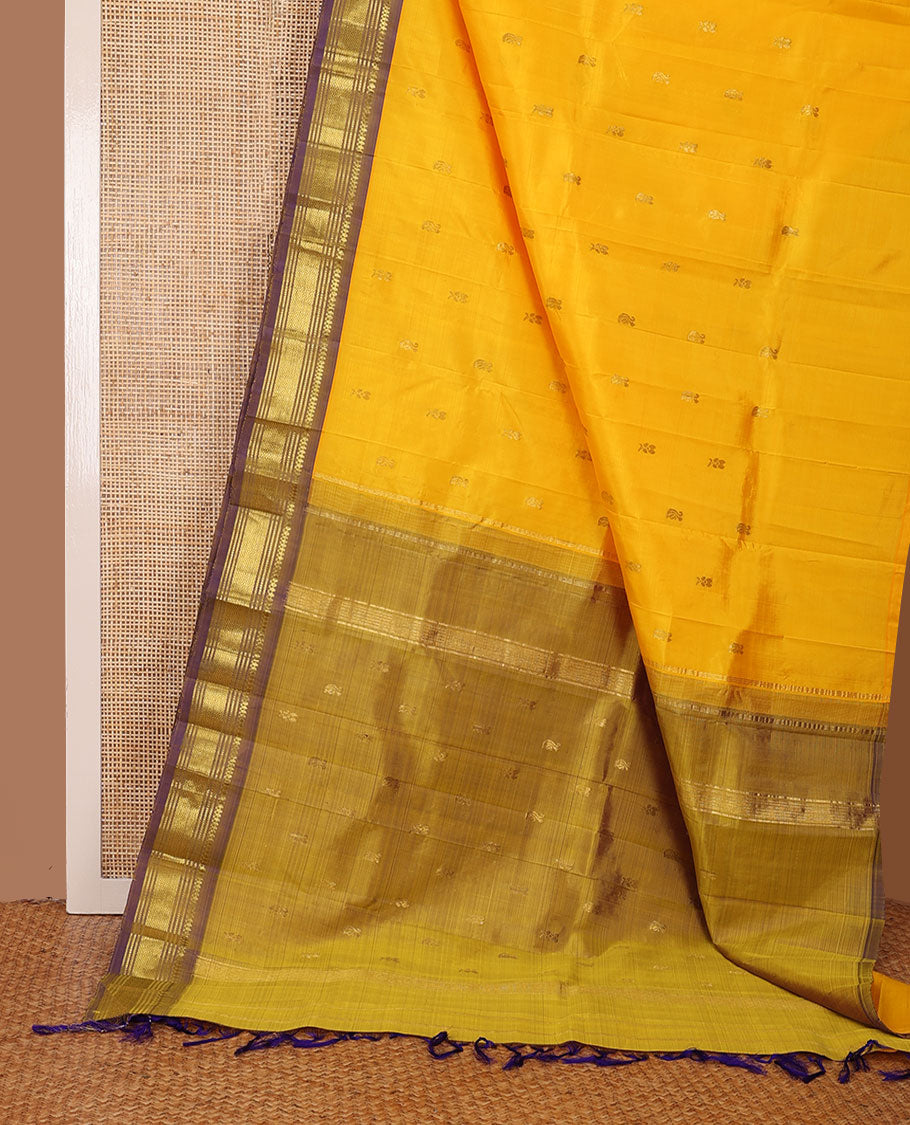 Yellow zari buttas Kanchipuram silk saree, contrast one-sided border of thilakam mokku,banaras,muthu & jaal, & zari design pallu