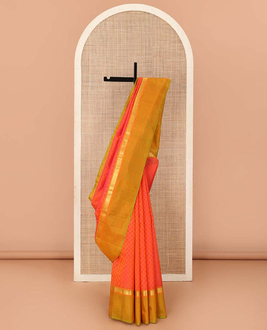 Orange Checked Kanchipuram Silk Saree, Complemented by Contrast Kal Erangina Border of Rekku, and Banaras Designs, Zari Design Woven Pallu, and Paired with a Contrast Blouse