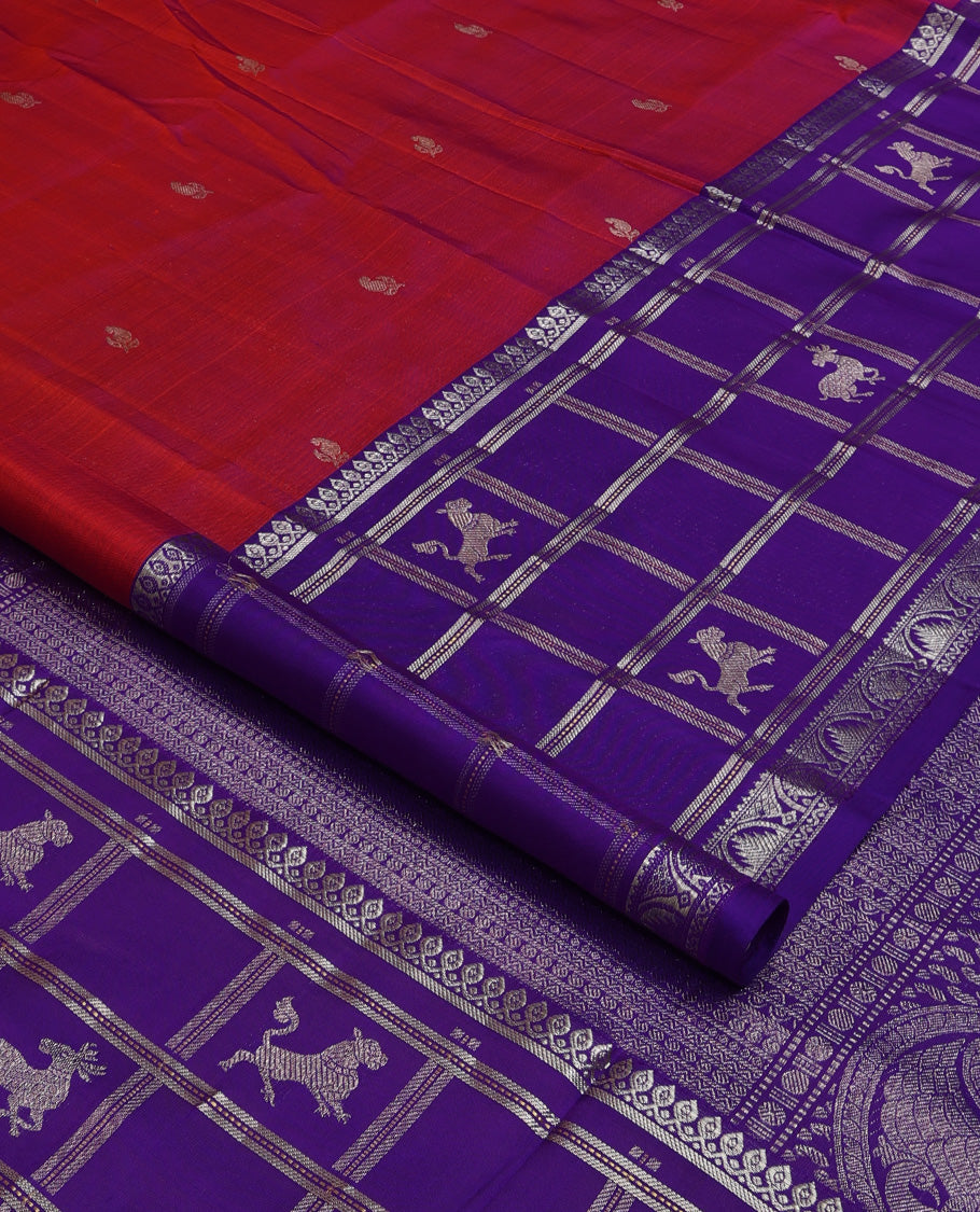 Red zari buttas Venkatagiri silk saree, contrast flora-fauna inspired kanchipuram zari border, and pallu steeepd with traditional designs