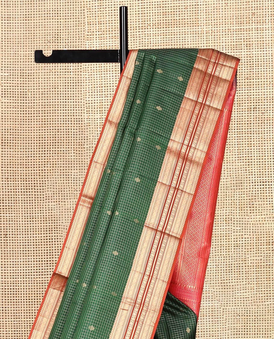Green Vasundhara Silk Saree, Showcasing Zari Buttas and Checks, a Contrast Border of Thilakam, Kathir, Cross Kamalam, and Kodi Visiry Designs, Grand Pallu, and Contrast Blouse