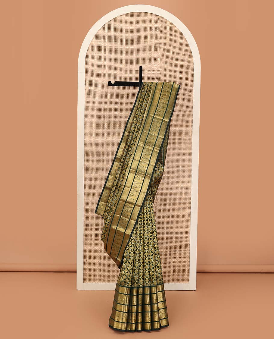 Green jacquard wedding silk saree, zari border of rekku, muthu, and manga designs, and intricate pallu