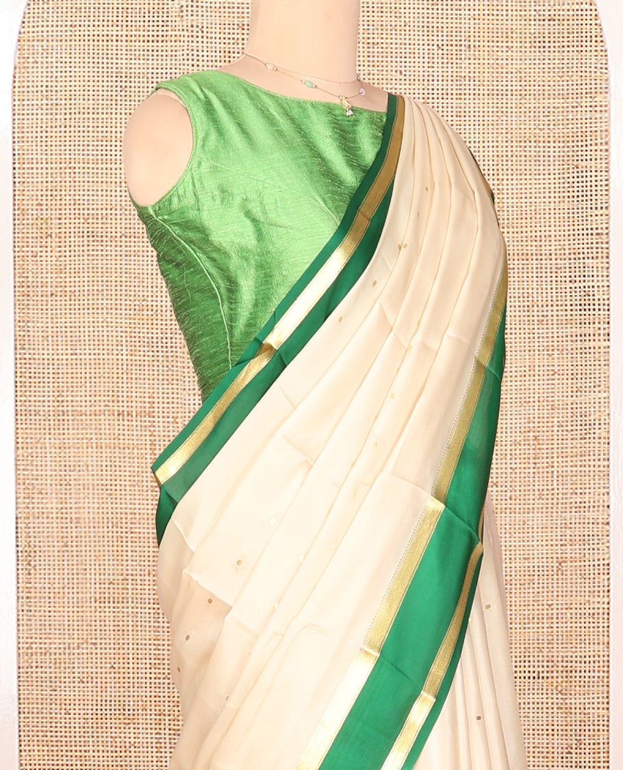 Cream Mysore Silk Saree, Embellished with Buttas, Complemented by a Contrast Traditional Zari Border, Zari Design Pallu, and a Contrast Blouse