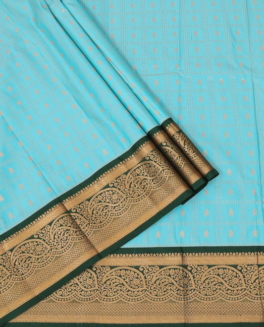 Blue Art Silk Pavadai Material Set, Decorated with Zari Butta Enclosed Checks All Over the Skirt, Complemented by a Contrast Paisley Zari Border, and Paired with a Contrast Blouse
