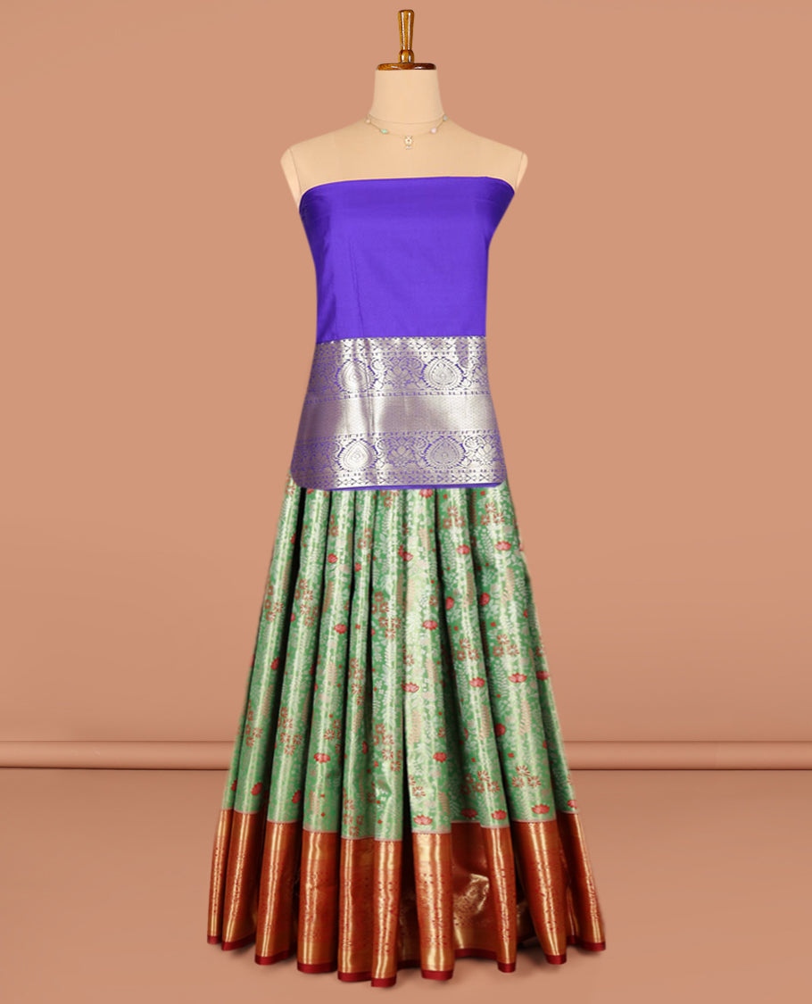 Green Art Silk Pavadai Material Set, Beautifully Bedecked with Floral Jacquard on Its Skirt, Complemented by a Contrast Traditional Zari Designs Border, and Paired with a Contrast Blouse