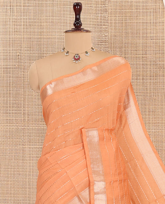 Orange Assam Silk Saree, Gleamed Up with Zari Stripes on Its Body, Highlighted by Zari Border, Pallu Steeped with Zari Stripes, and Paired with a Contrast Blouse