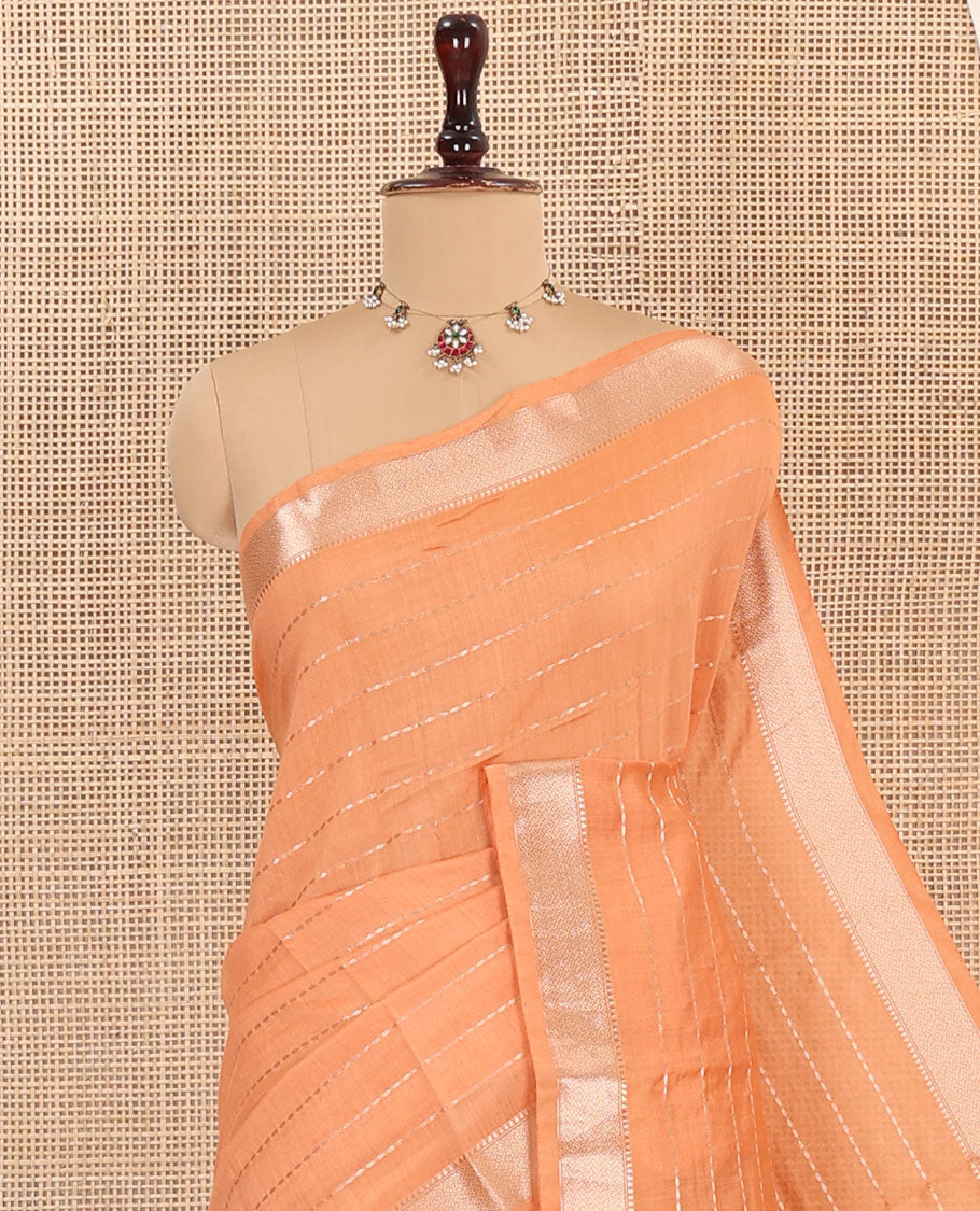Orange Assam Silk Saree, Gleamed Up with Zari Stripes on Its Body, Highlighted by Zari Border, Pallu Steeped with Zari Stripes, and Paired with a Contrast Blouse