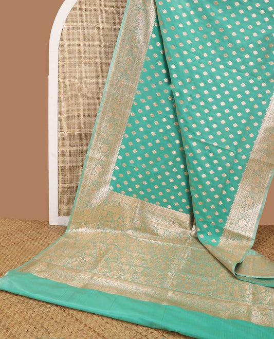 Sea green leaf buttas semi banaras nylon saree with self traditional zari design border & floral vine design pallu