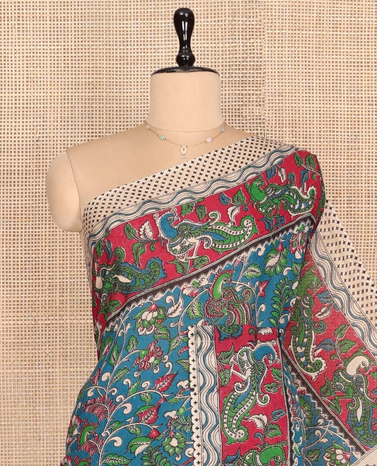 Blue Machine-Printed Kalamkari Cotton Saree Features Floral and Peacock, a Contrast Peacock Border, Kalamkari Printed Pallu, and a Contrast Blouse