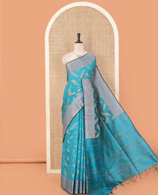 Blue leaf buttas dupion saree, traditional border of floral creeper designs, and pallu of multi-colored thread stripes