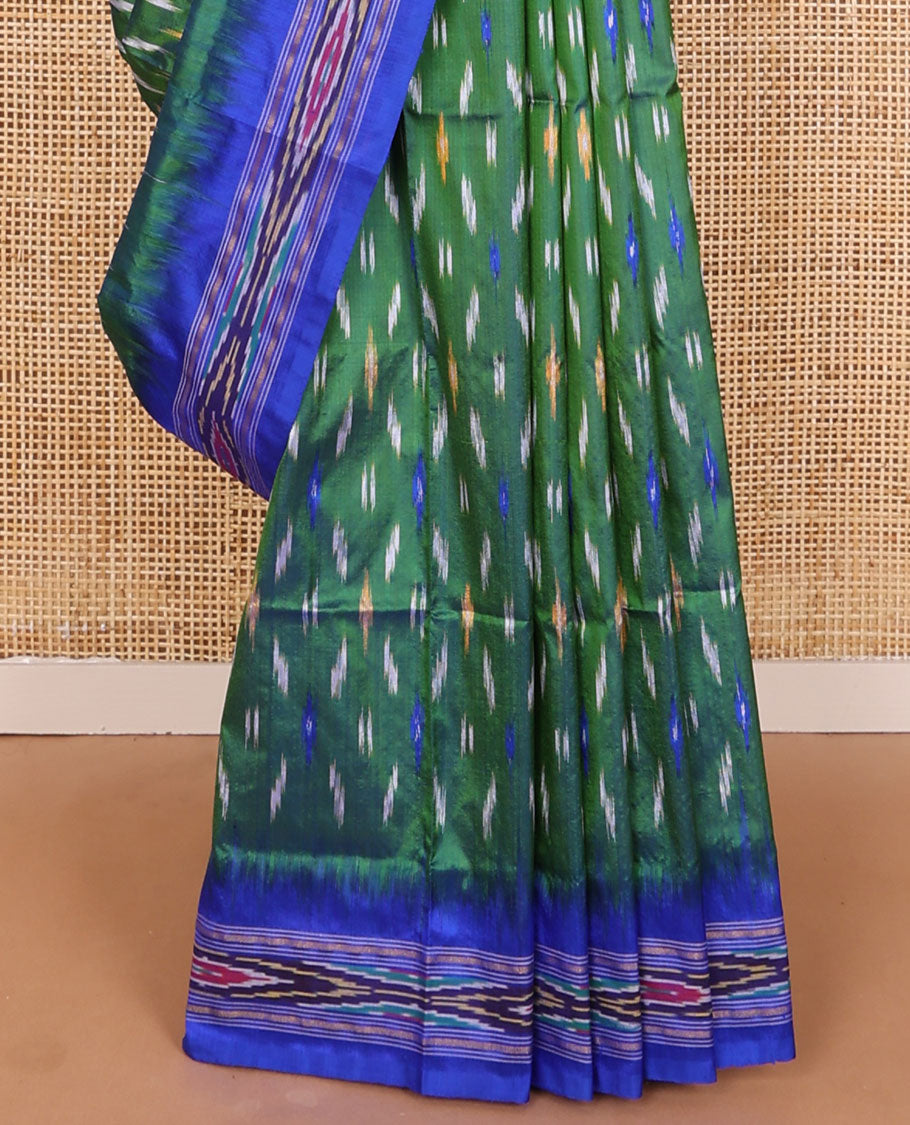 Green buttas ikkat saree, contrast ikkat border & pallu of ikkat weave & stripes